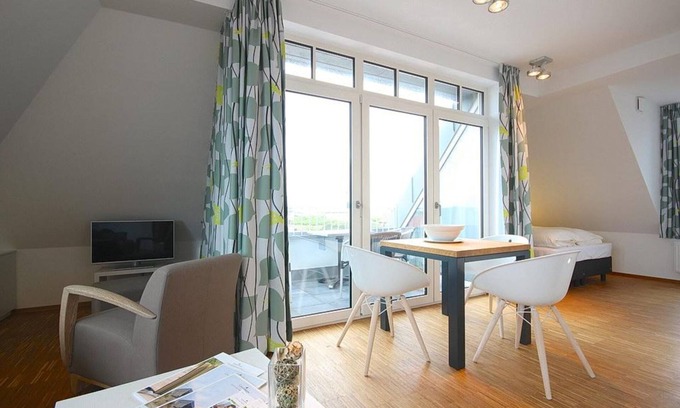 Horum Apartment | Pretty 1-room top floor apartment with sheltered loggia - 100 m to the beach!