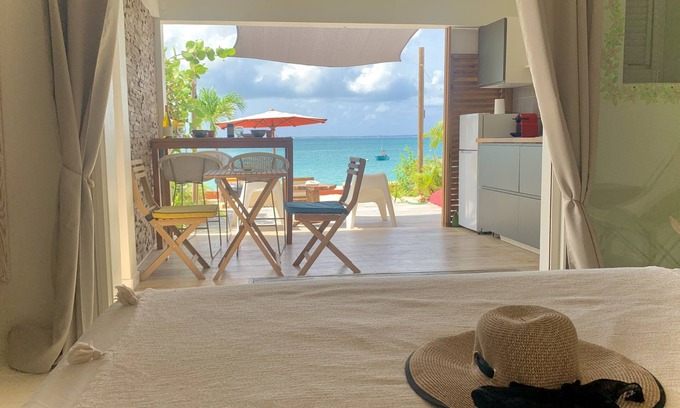 Grand Case Apartment | Pretty Beach side appartment with a private garden. Unique setting, Unique spot