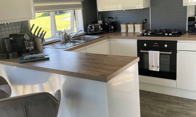 Llanllwchaiarn Ski Chalet | Private Chalet in New Quay with stunning views