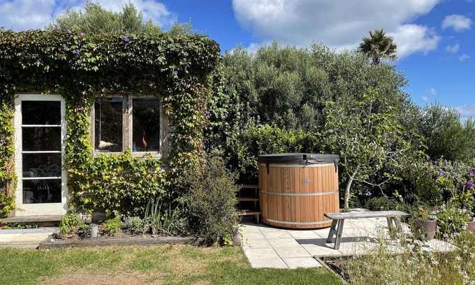 Surfdale House | Private. Sunny. Twin sea views, cedar tub, mediterranean gardens, flat lawns.