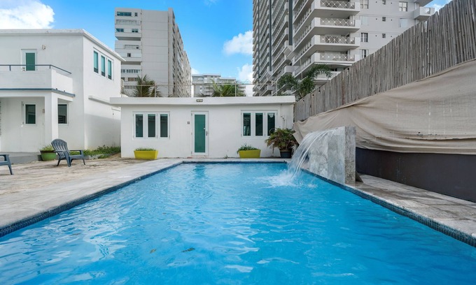 Punta Las Marias Apartment | Puerto Rico Beach Rental w Pool Balcony Otium Rentals