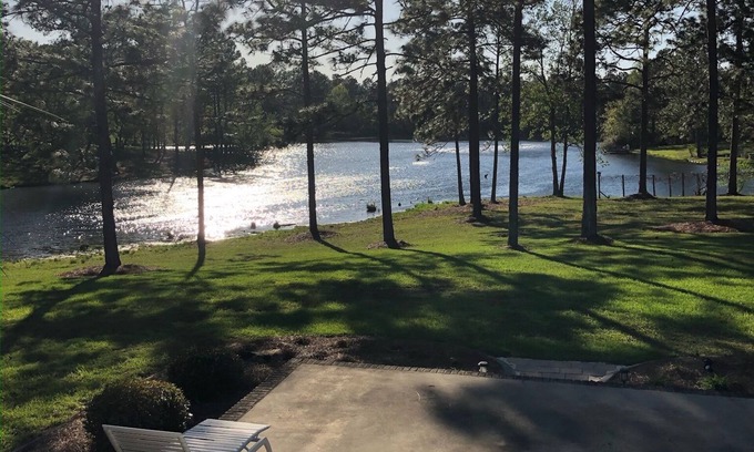 Jesup House | Quiet lake front property in peaceful neighborhood setting.
