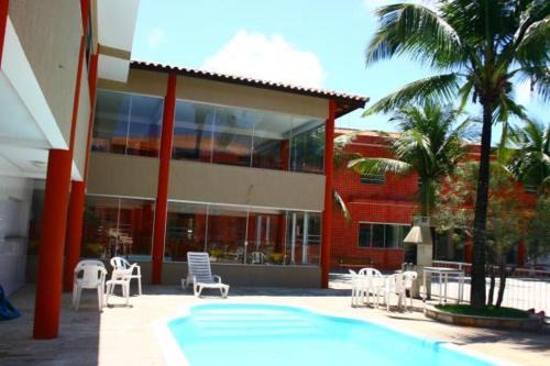 Taperapua Beach Hotel | Rede Andrade Porto Praia