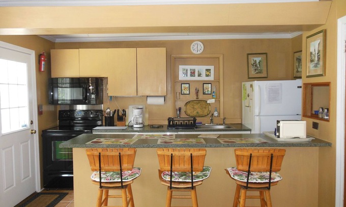 Dewey Beach Cottage | Rehoboth Bay Cottage - Bay view, family friendly,1 1/2 block walk to ocean beach