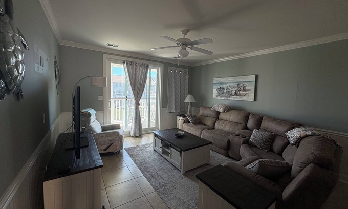 Sunset Island Condo | Relax in this 3BR 2BA second floor condo in gated community with pool and beach
