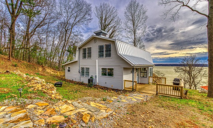 Killen House | Relax with the family at this beautiful lakefront cabin located on Wilson Lake.