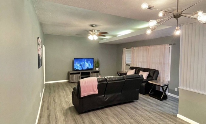 Orange House | Relax with your family in this newly renovated home away from home.