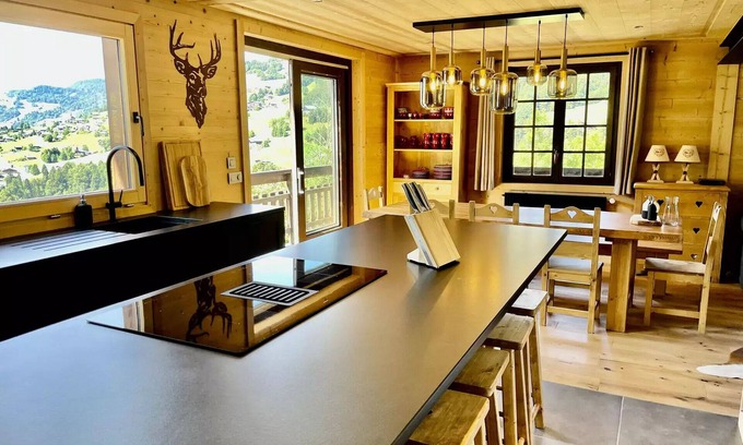 Flumet Ski Chalet | Residence Chez Simone - Chalet Simone overlooking a typical village in Val d'Arly