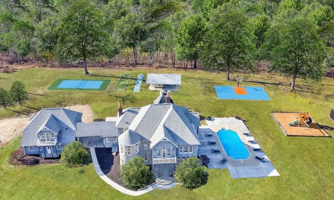 Logan Apartment | Resort backyard | Pool | Game Room | Basketball