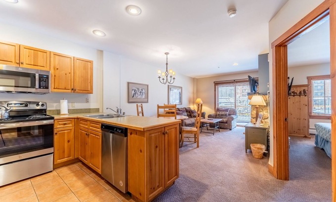 River Run Condo | River Run Condo with Spacial Balcony overlooking Ice Rink & Mountain Views!
