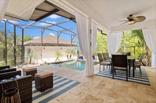 Palm Coast House | Romantic Beach Home with Heated Pool Golf Cart