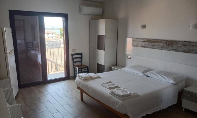 Girasole House | Room 'Junior Suite Marisa' with Balcony, Wi-Fi and Air Conditioning