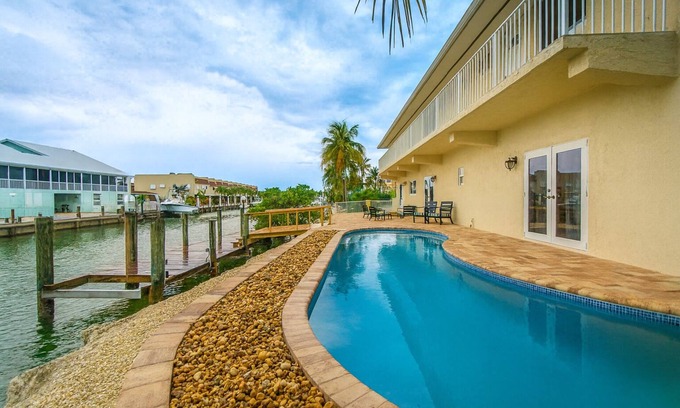 Marathon House | Salty Anglers: Waterfront Heated Pool, Dock & Walk to Sombrero Beach in Marathon