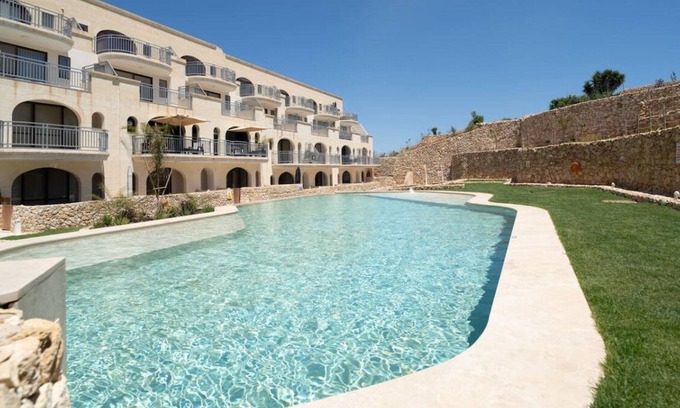Qala Apartment | Serene Apt with Terrace & Pool & BBQ Access,Qala