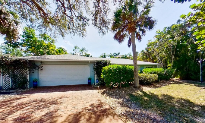 Bay Isle House | Siesta Key home with private pool, spa, fenced yard, screened lanai, & AC