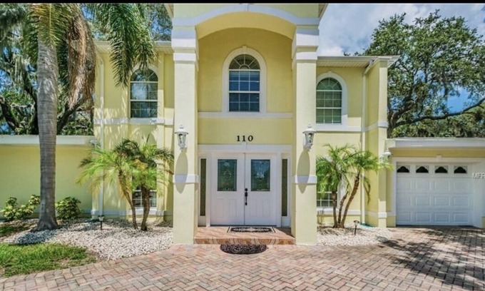 Harbor Bluffs House | Sleeps 16 with Hot Tub & Game Room located near IRB & Clearwater Beach!