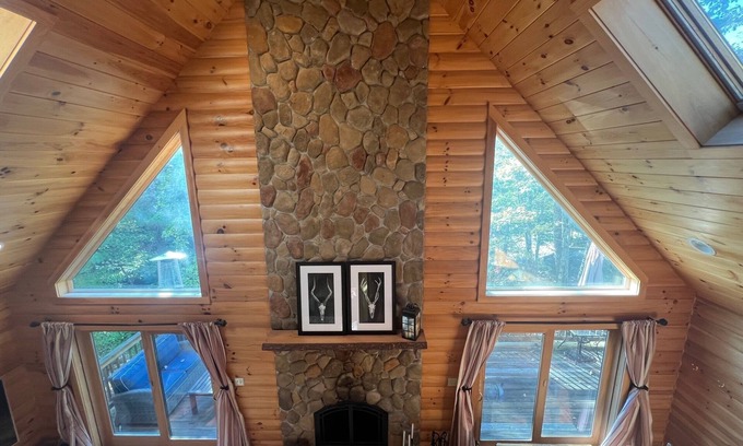 East Wakefield House | Spacious Lakefront Log Home for Family Fun & Relaxation- deck, firepit, gameroom