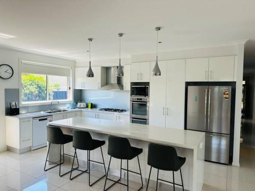 Rosebud Villa | Spray your best Rosebud