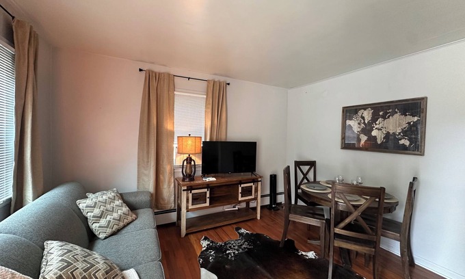 Sheridan House | "Steps from downtown and the park, this cozy mid-century hideaway offers comfort, charm, and a private outdoor escape."