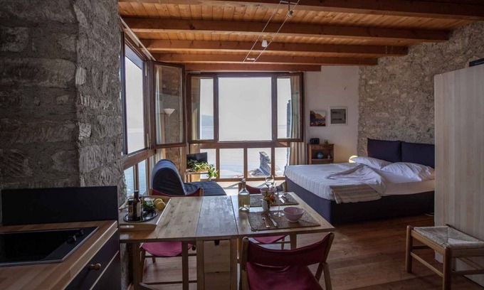 Tignale Apartment | Studio rustically furnished, overlooking lake and with terrace