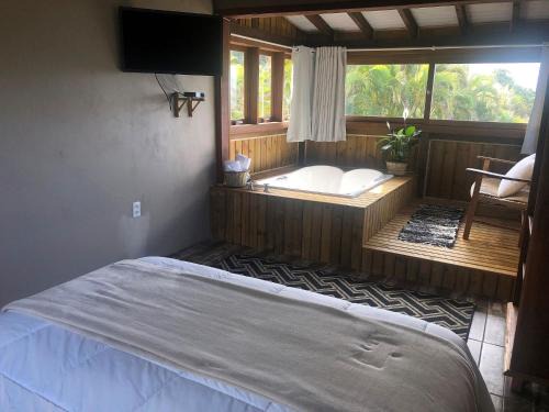 Praia do Rosa Cabin | Studios do Barão - Conforto e privacidade em meio à natureza