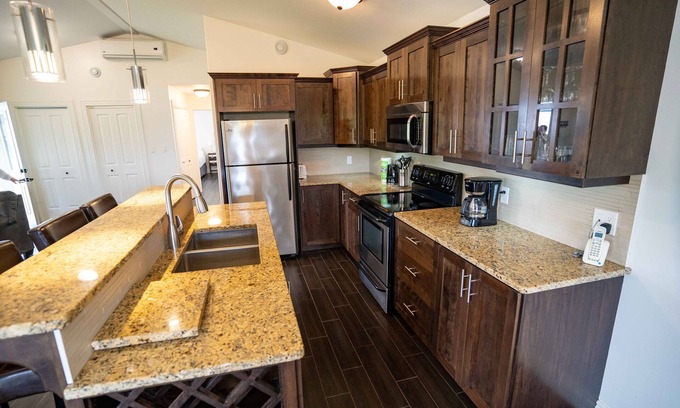 Stanley Bridge Condo | Stunning home away from home with outdoor fireplace