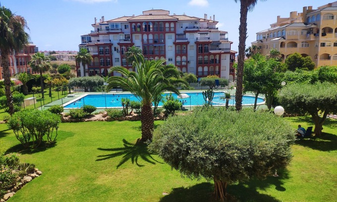 Torrevieja Apartment | Stunning Sea views, swimming pool in tropical garden, close to the sea, parking