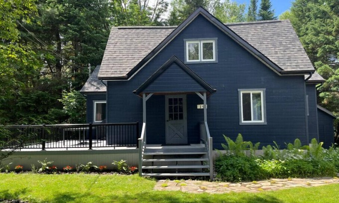 Mont-Tremblant Ski Chalet | Stylish and Serene Chalet Escape.nLake access w canoe, kayaks, paddleboards