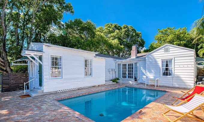 Poiciana Park II Apartment | Stylish, dog-friendly home with a pool, enclosed yard, patio, & central AC