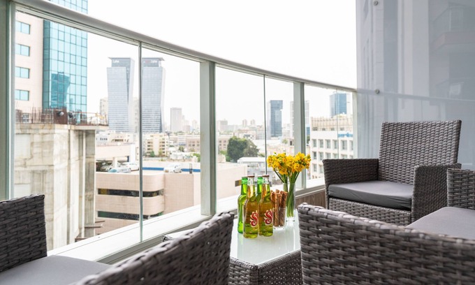 Tel Aviv Apartment | Sunlit Urban Escape with Balcony by Sea N Rent