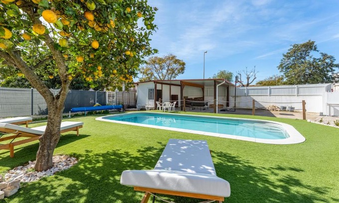 Albufeira Apartment | Sunny 3BDR Apt with Pool in Ferreiras by LovelyStay