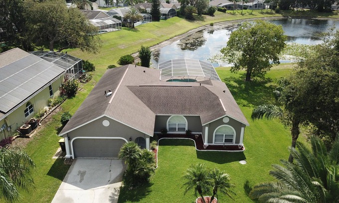 Sunridge Woods Villa | Sunridge Siesta | Beautiful pond facing pool home