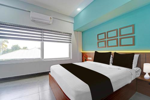 Nedumangad Hotel | Super Hotel O KSRTC Bus Terminal Venjarammoodu Formerly Downtown