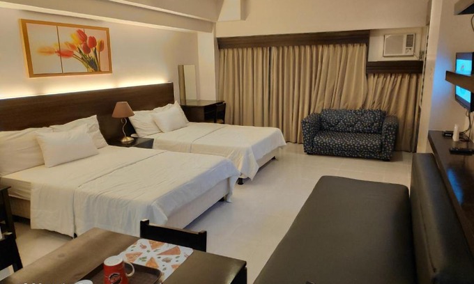 San Jose Apartment | Tagaytay Staycation by Naya and Darla w Free Swimming Pool, WiFi & Netflix