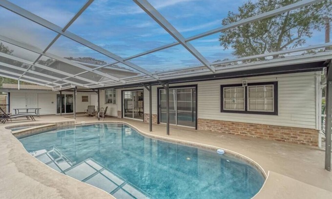 Riverside Heights House | Tampa Retreat: Poolside & Spa Fun and City Vibes