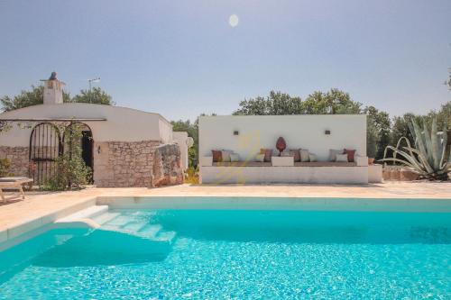 Fumarola House | TD Trulli Chiara Tastefully Decorated Trulli with Pool