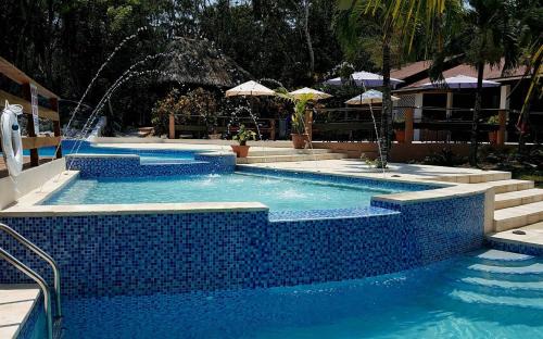 San Ignacio Resort | The Log Cab-Inn