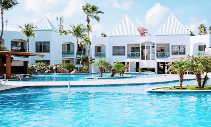 Palm Beach Hotel | The Mill Resort & Suites