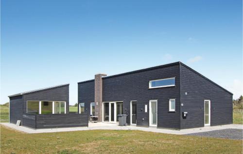 Nørre Lyngby House | Three-Bedroom Holiday Home Løkken With A Fireplace 07
