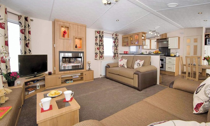 Burnham-on-Sea House | Top of the range 12ft-wide caravan with one double and two twin.