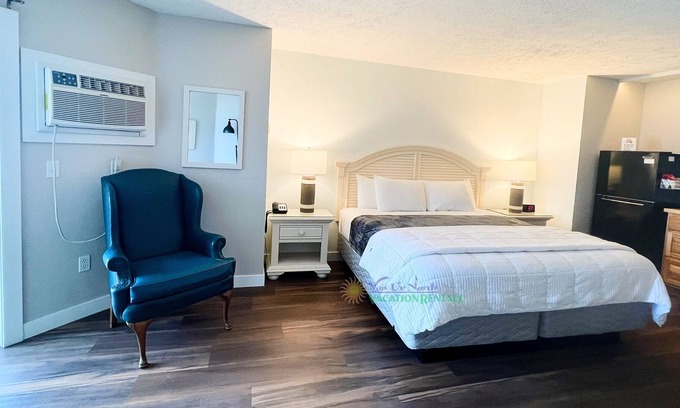 Traverse City Condo | Traverse City studio condo on Sandy Beach. Ground floor. Outdoor pool. A/C.