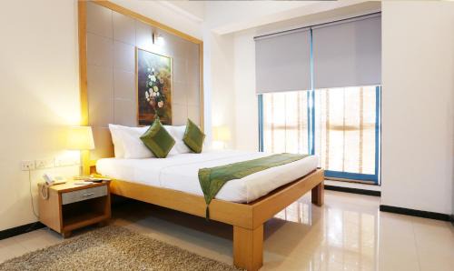 Ejipura Hotel | Treebo Edha Suites Koramangala