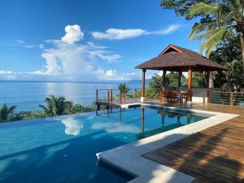 Tango Mar Villa | Tropical cliff house, 3 minute walk to the beach