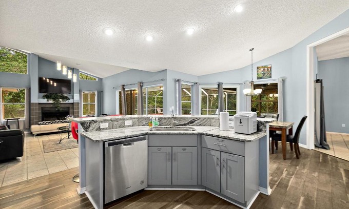 Palm Coast House | Tropical Escape with Relaxing Pool & Palm Breezes