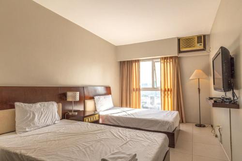 Ortigas Center Apartment | Twin Bed Hotel Type by Ph Philstay