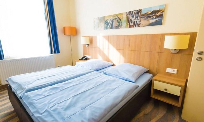 Norderney House | Two-room room comfort (up to 4 persons) - Hotel Garni Inselhotel Bruns