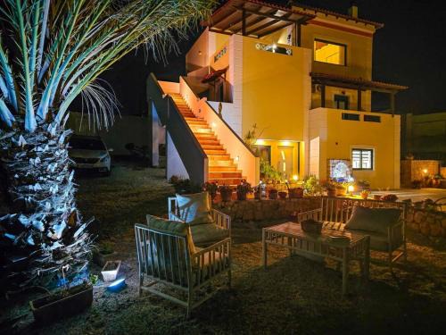 Sternes Villa | Villa Aitheras with sea views and garden