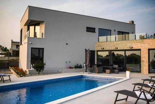 Jursici Villa | Villa EmMa Istria in Central Istria with sea view, pool heating and underfloor heating