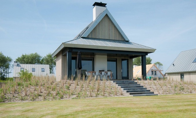 Tholen House | Villa in Netherlands with Waterfront Luxury