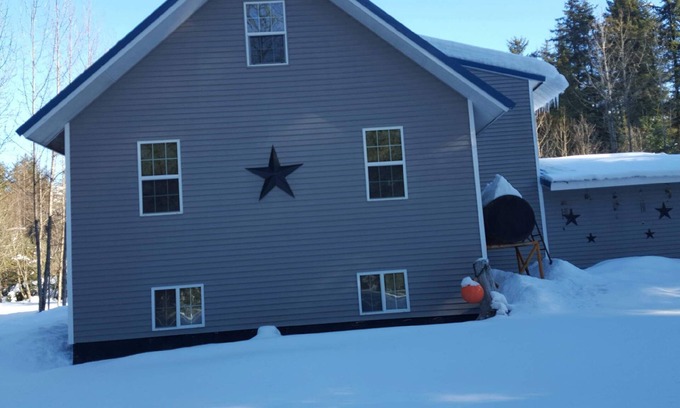 Bear Creek Apartment | Walk to see salmon in Bear Creek. The entire bottom floor is your apartment.